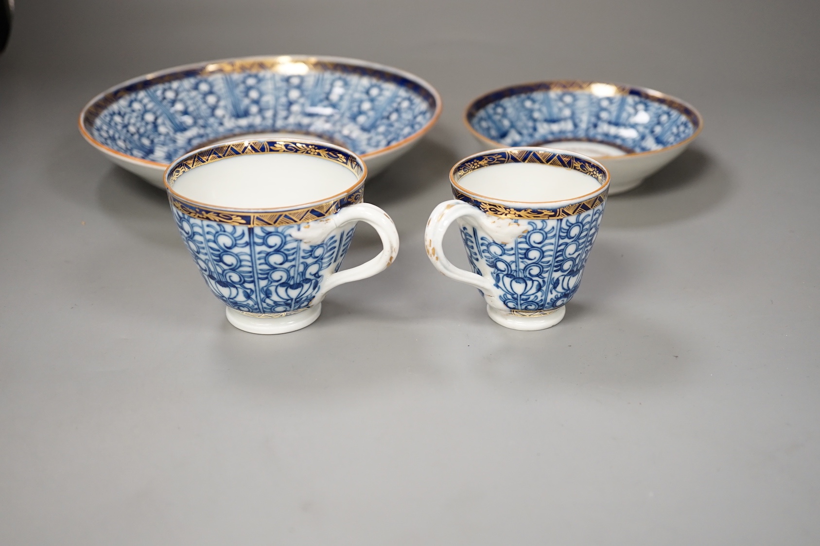 Chamberlains Worcester Armorial teawares, coffee cup, teacup and saucer and a saucer shaped dish, centres with the crest of a stag